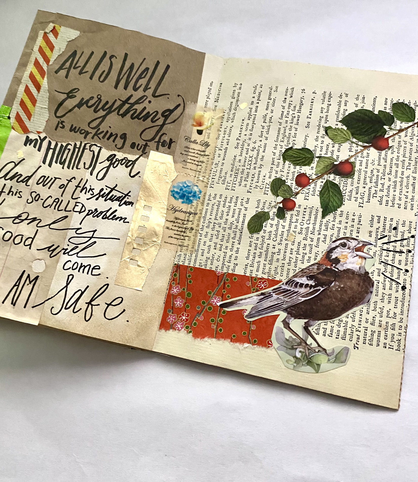 Junk journal spread with hand lettering and bird image